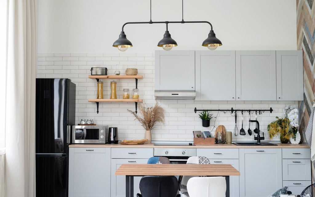 clean kitchen with pasta in glass jars to keep cockroaches from coming back
