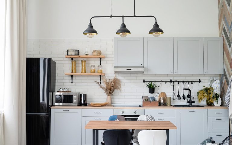 clean kitchen with pasta in glass jars to keep cockroaches from coming back