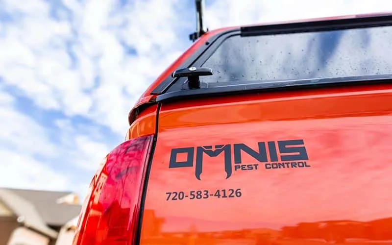 OMNIS-Pest-Control-truck-with-phone-number-med