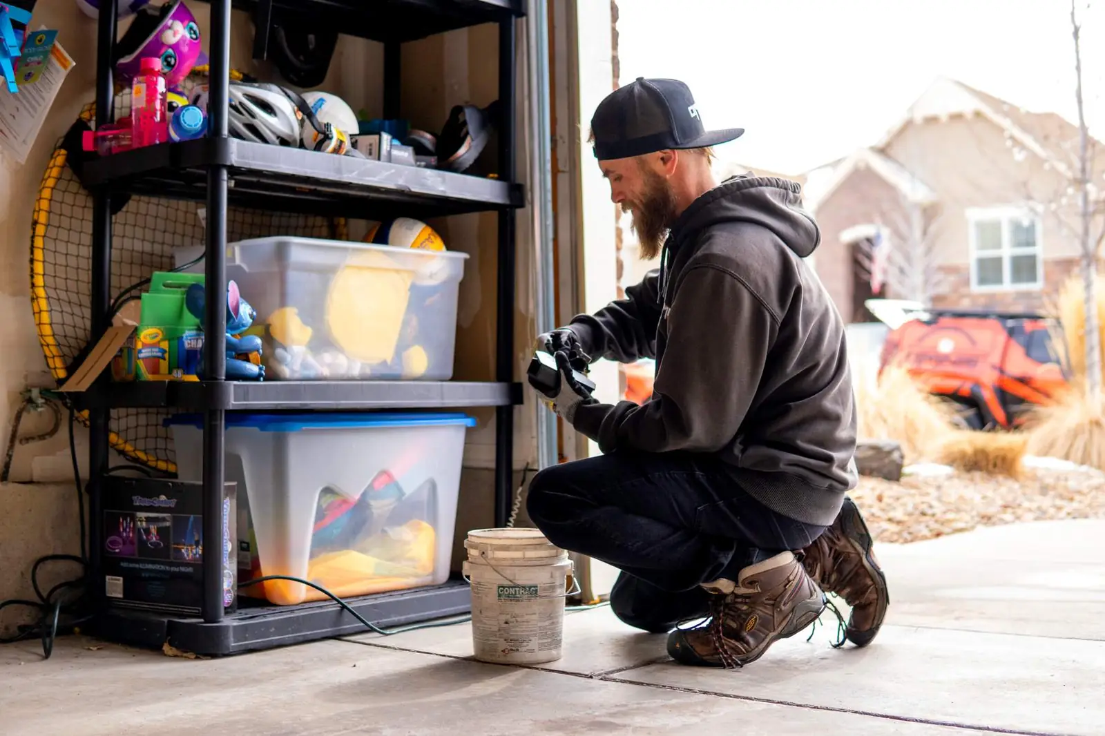 OMNIS technician setting a bait station